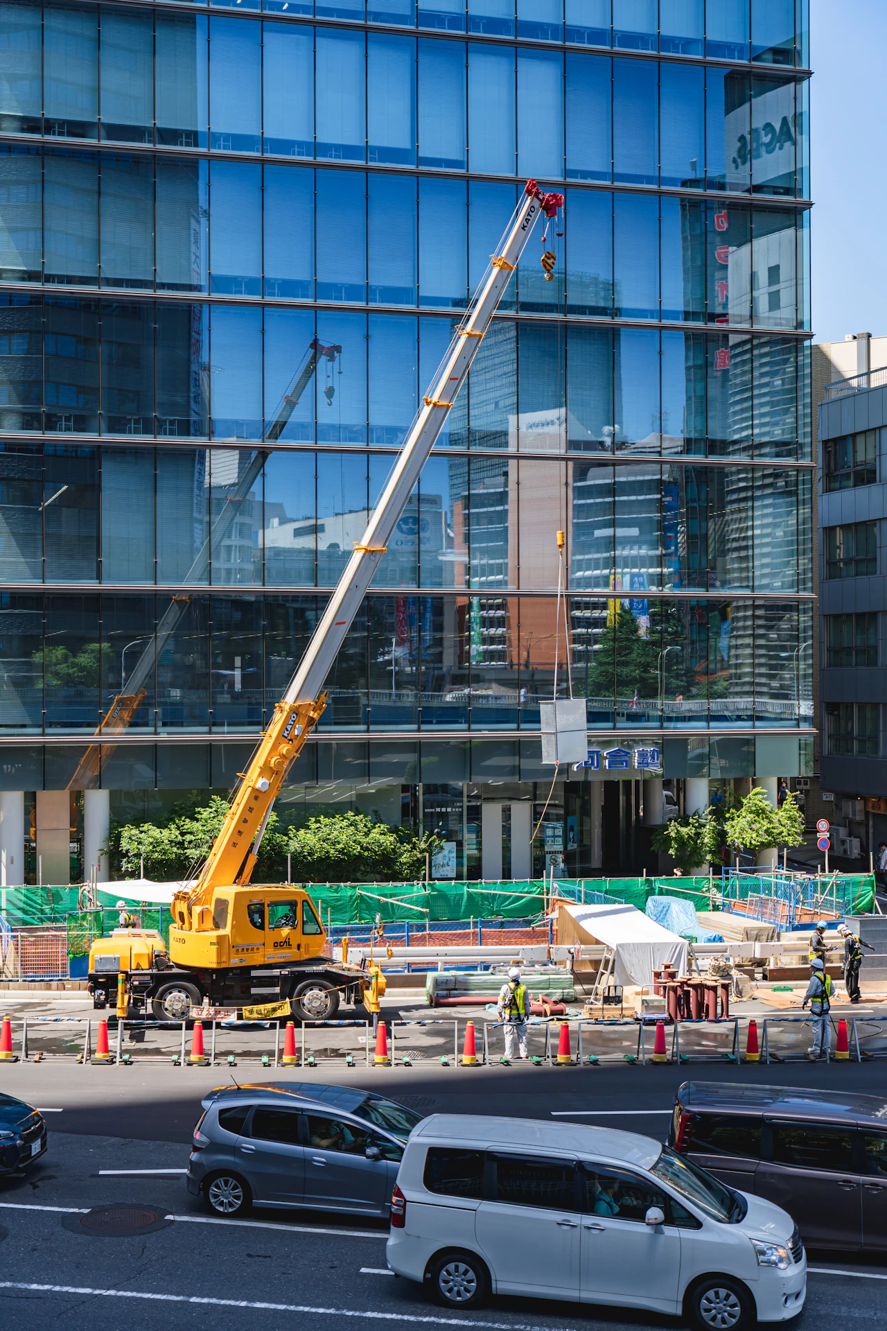 A real Kato mobile crane on a construction site in Japan